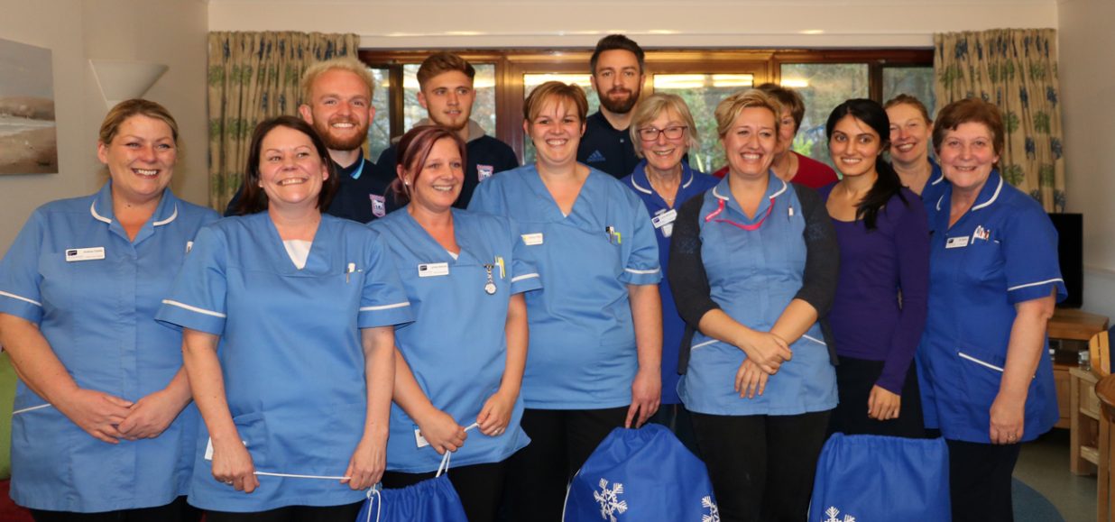 Ipswich Town Football Club help spread festive cheer with hospice visit
