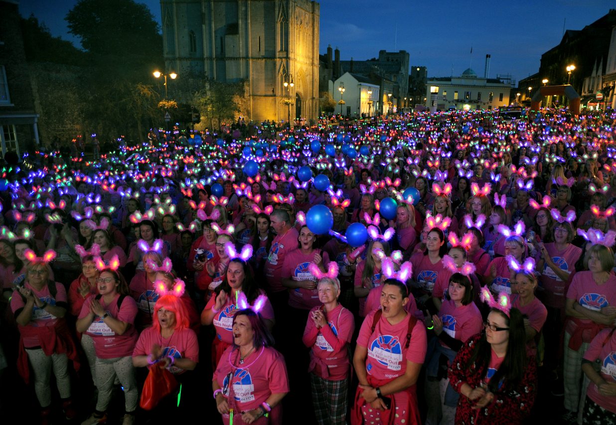 Flashing bunny ears light up town as walkers raise thousands for hospice