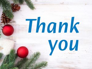 The words Thank you against a Christmas background