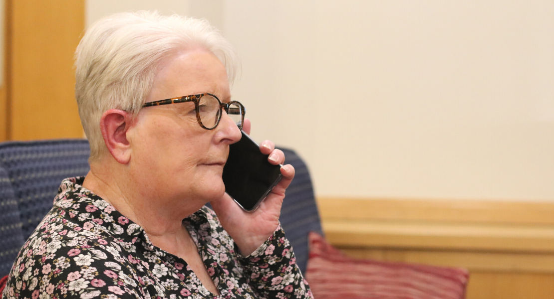 psychological services team member on phone