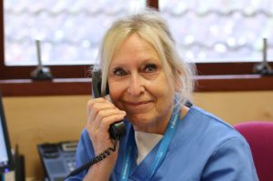 hospice community team member on telephone