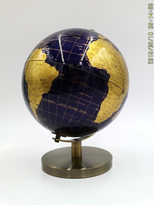 blue and gold globe on stand