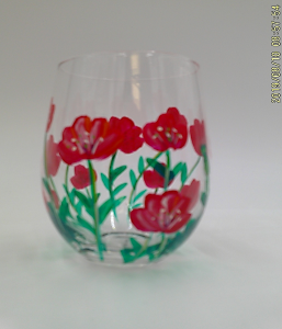 clear stemless glass with poppy design