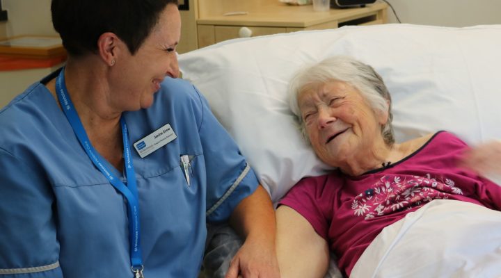 Image of Hospice Care Assistant and patient talking