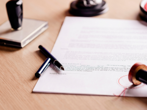 Photo of a Will being signed