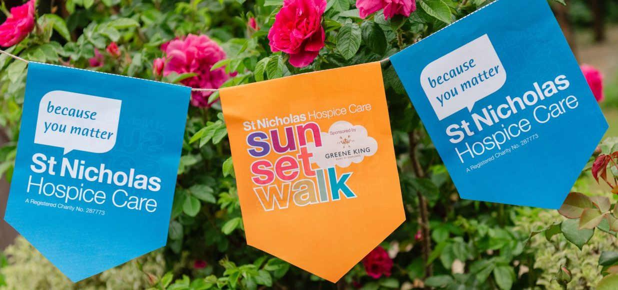 sunset walk banners against a flowery backdrop