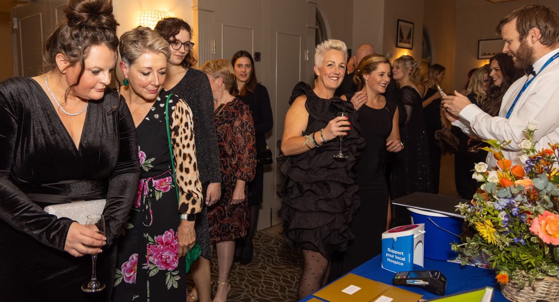 Hospice Gala attendees taking part in the raffle