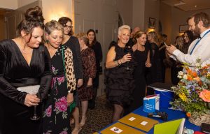Hospice Gala attendees taking part in the raffle