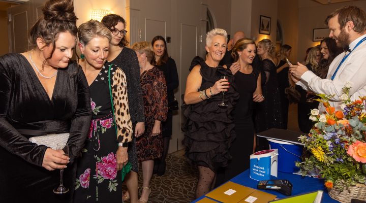 Hospice Gala attendees taking part in the raffle