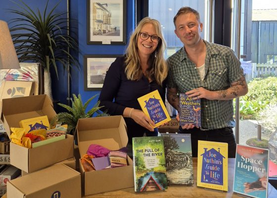 Local authors Helen Fisher and Matt Gaw with their books