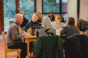 Corporate supporters sitting around a table at the Link Networking event