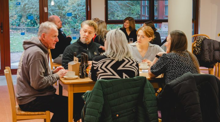 Corporate supporters sitting around a table at the Link Networking event