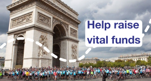 Dozens of charity cyclists gathered at the Arc de Triomphe