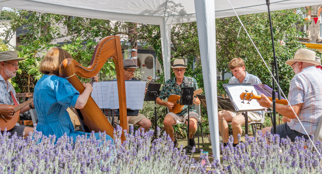 Musicians playing at the Hidden Gardens of Bury
