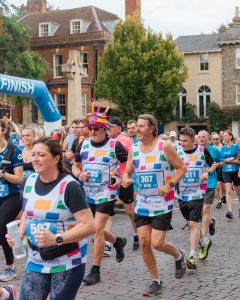 10K runners wearing St Nicholas Hospice Care running vests